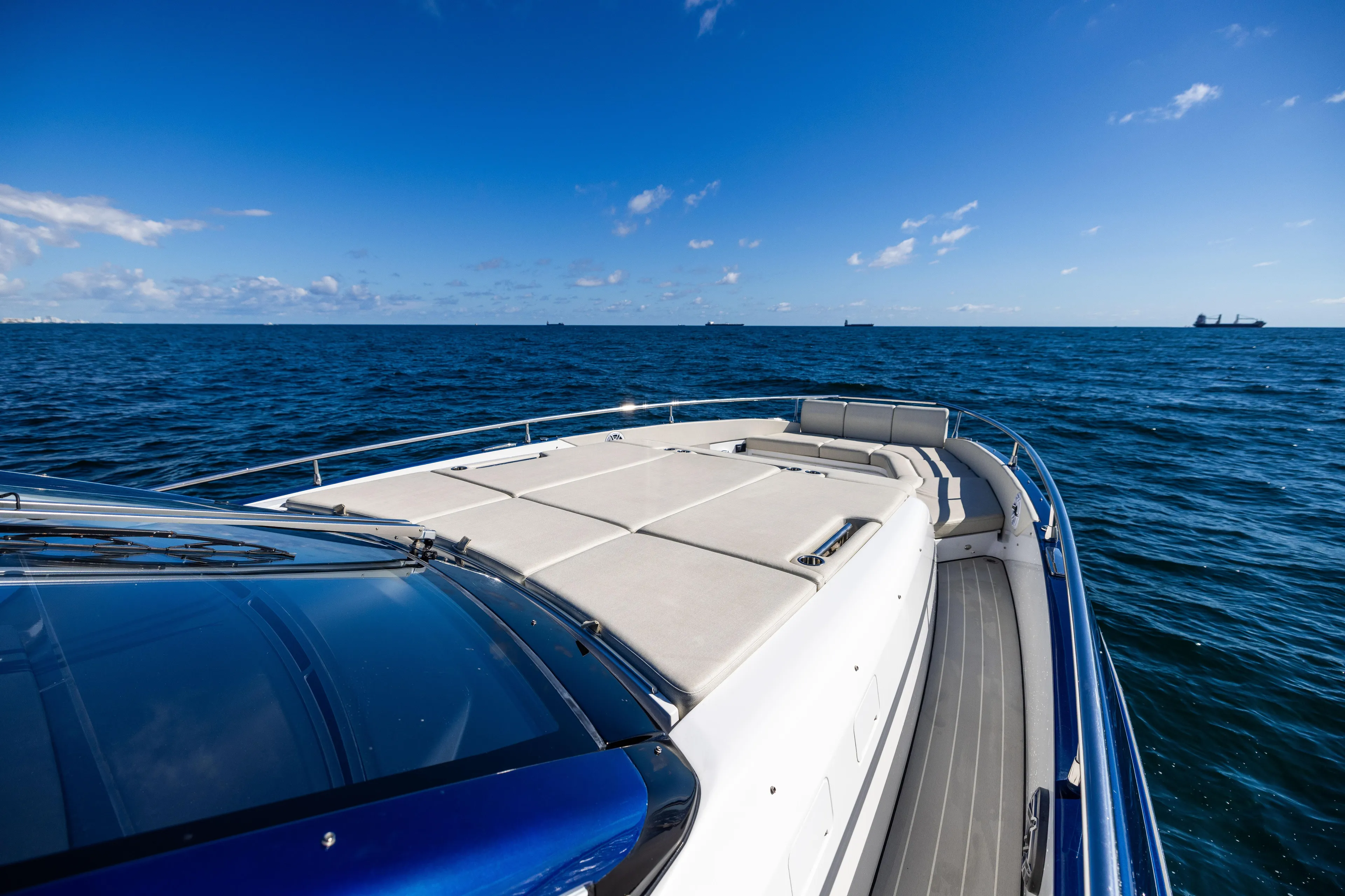  Yacht Photos Pics Azimut Verve 47 yacht cruising on open sea under clear blue sky, 2022 model.