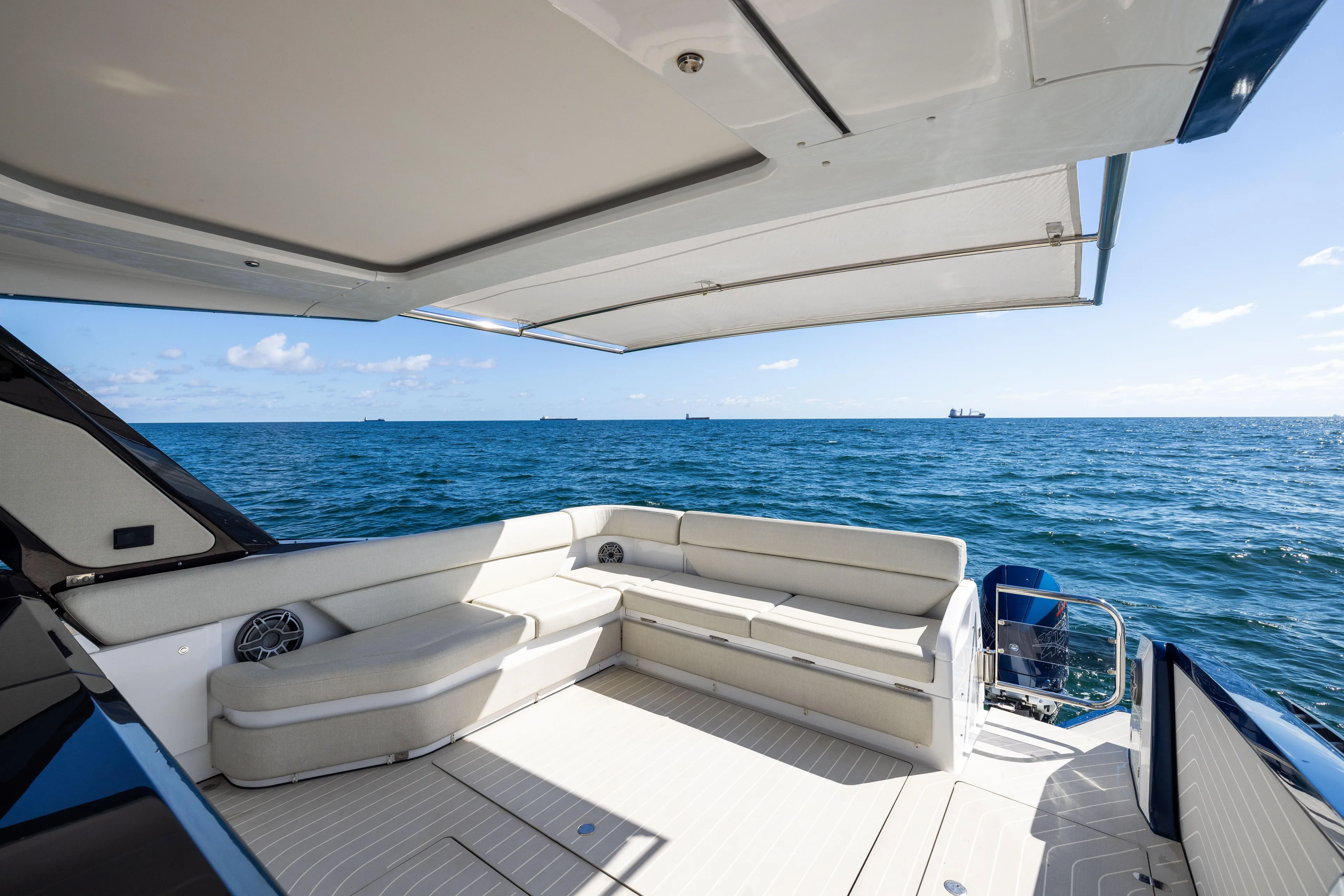  Yacht Photos Pics Luxurious 2022 Azimut Verve 47 yacht with spacious seating, cruising on open sea.