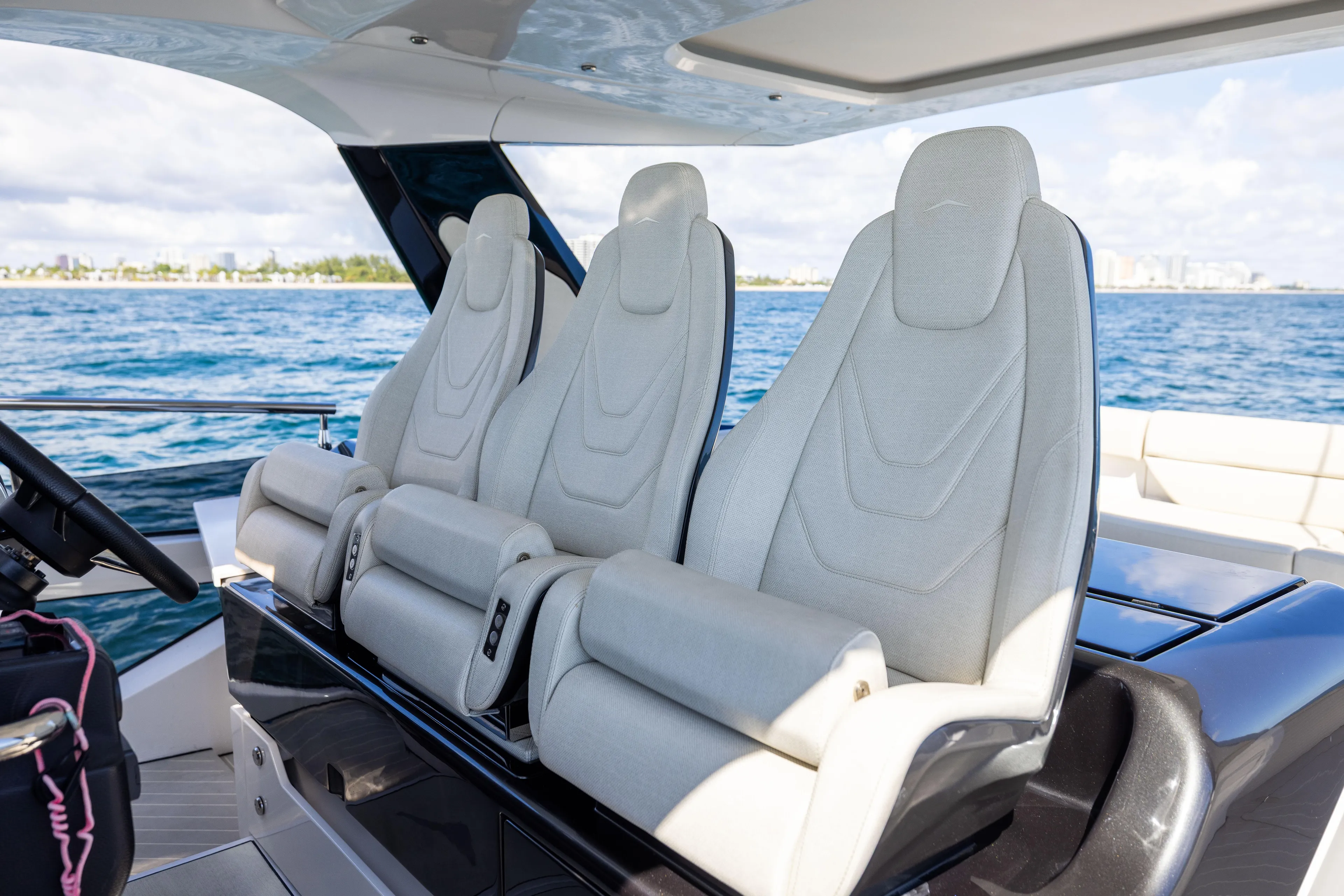  Yacht Photos Pics Luxury seating on 2022 Azimut Verve 47 yacht, ocean view in background.