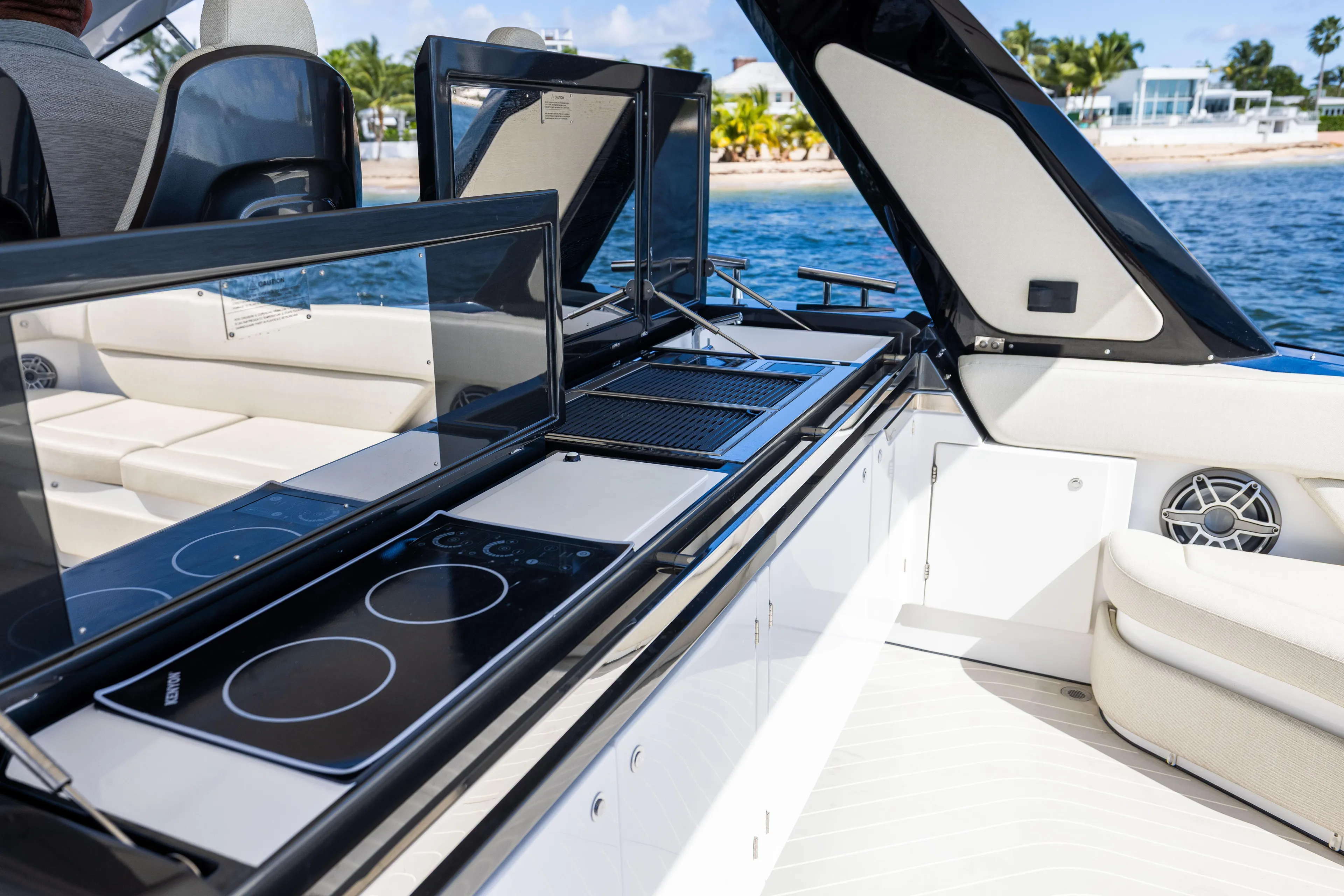  Yacht Photos Pics Luxury outdoor kitchen on 2022 Azimut Verve 47 yacht, featuring modern appliances and sleek design.