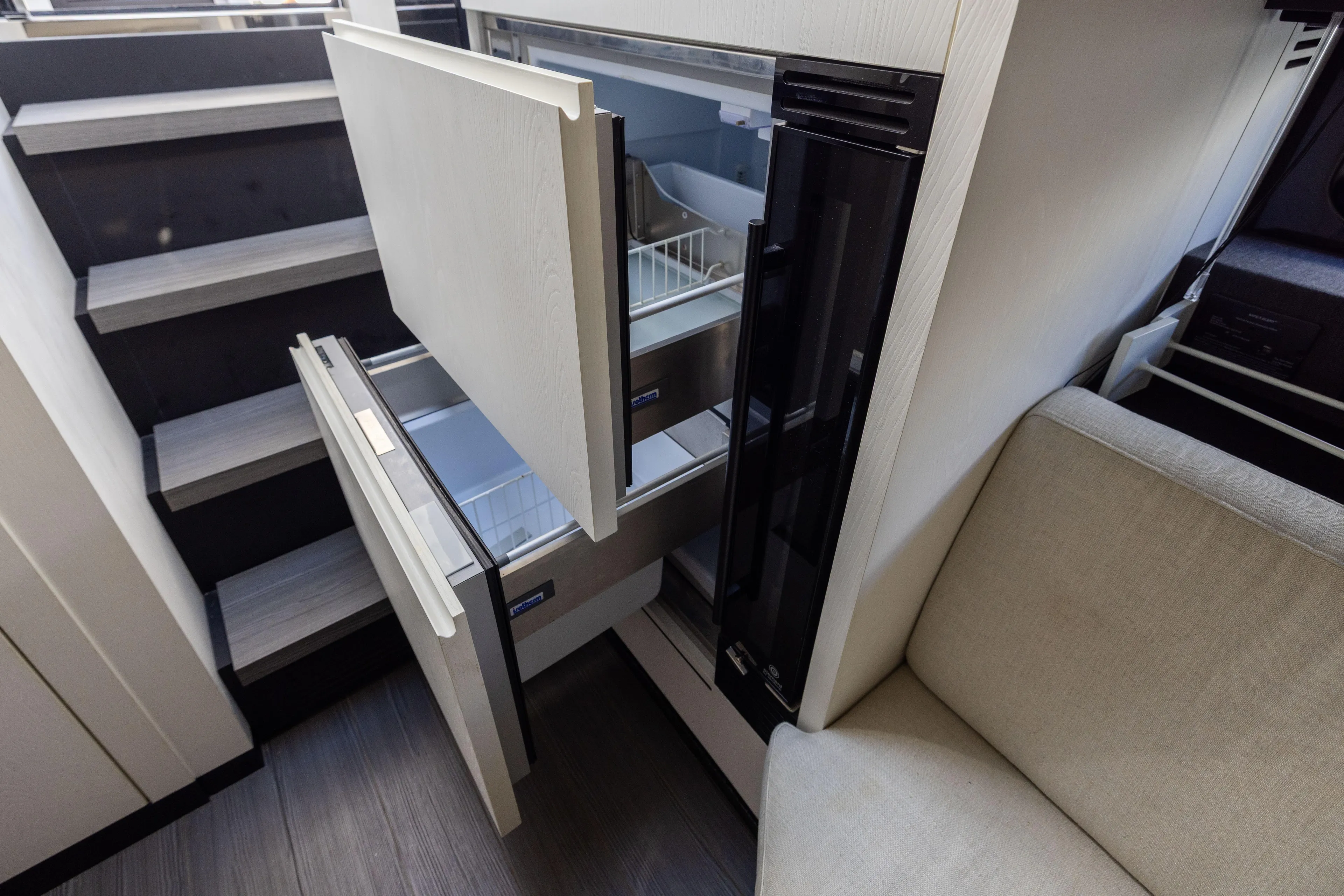  Yacht Photos Pics Modern kitchen area in 2022 Azimut Verve 47 yacht with open drawers.