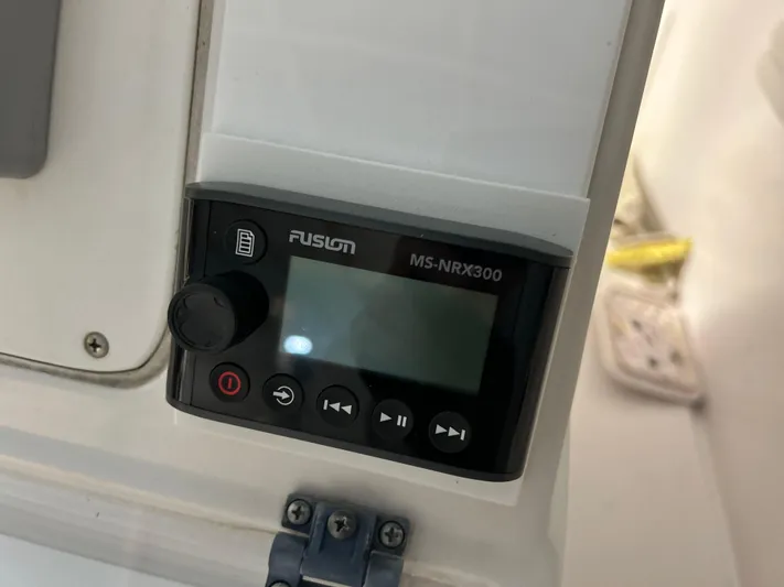  Yacht Photos Pics Fusion MS-NRX300 stereo system on 2007 Donzi 38 ZF Cuddy boat dashboard.