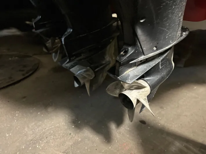  Yacht Photos Pics Propellers of a 2007 Donzi 38 ZF Cuddy boat, close-up view.