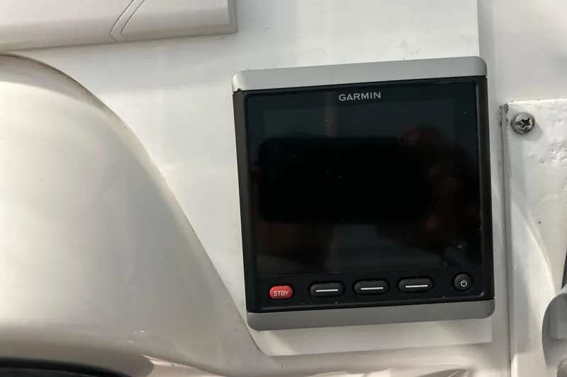  Yacht Photos Pics Garmin device on 2007 Donzi 38 ZF Cuddy boat dashboard.