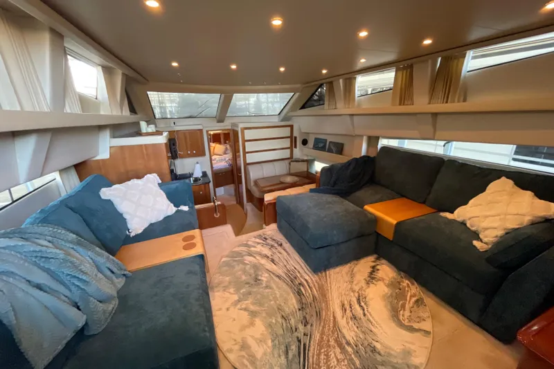 Stay The Course Yacht Photos Pics Luxurious interior of 2006 Carver 43 Motor Yacht with plush seating and modern decor.