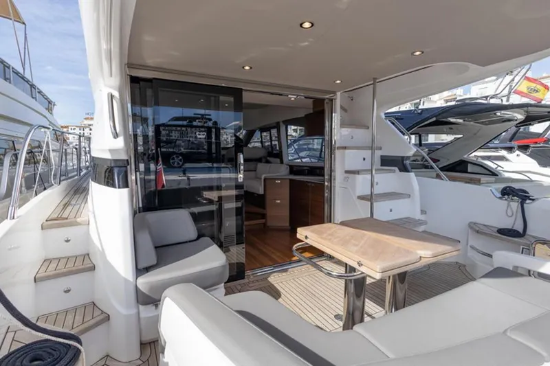  Yacht Photos Pics Luxurious 2021 Princess F45 yacht interior with elegant seating and dining area.