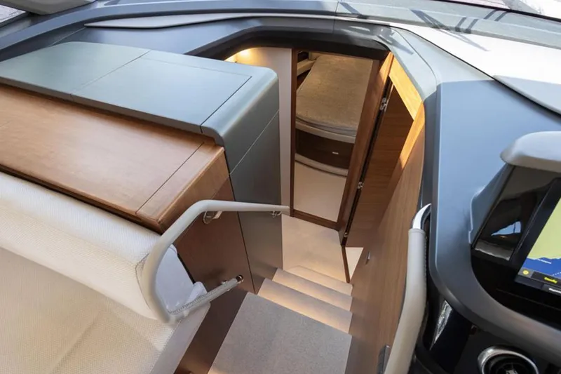  Yacht Photos Pics Interior view of 2021 Princess F45 yacht, featuring stairs and cabin entrance.