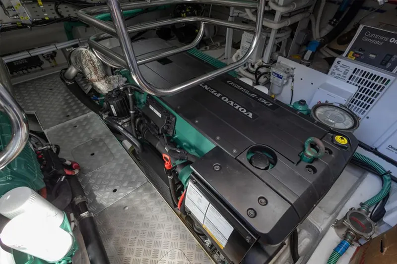  Yacht Photos Pics Engine room of a 2021 Princess F45 yacht featuring a Volvo Penta engine.