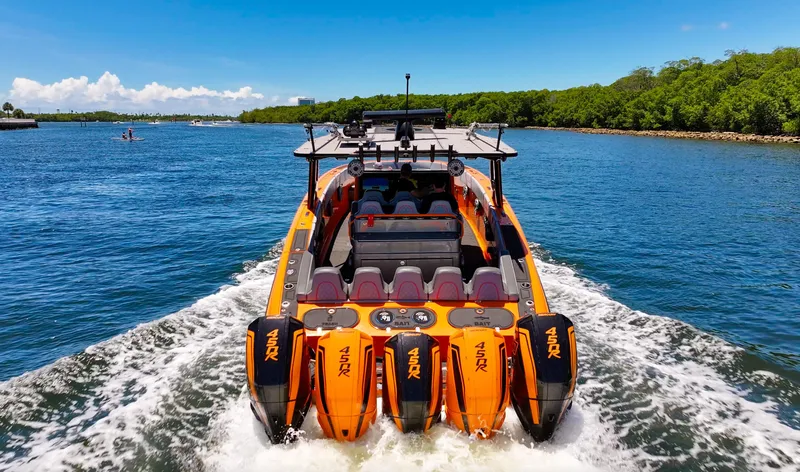  Yacht Photos Pics 2022 Midnight Express 43 Open boat cruising on a sunny day with powerful engines.