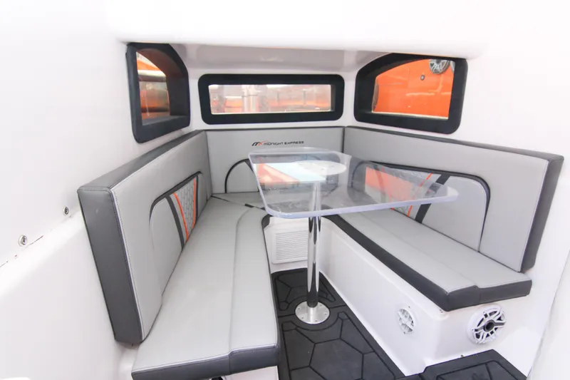  Yacht Photos Pics Interior of 2022 Midnight Express 43 Open boat with modern seating and table.