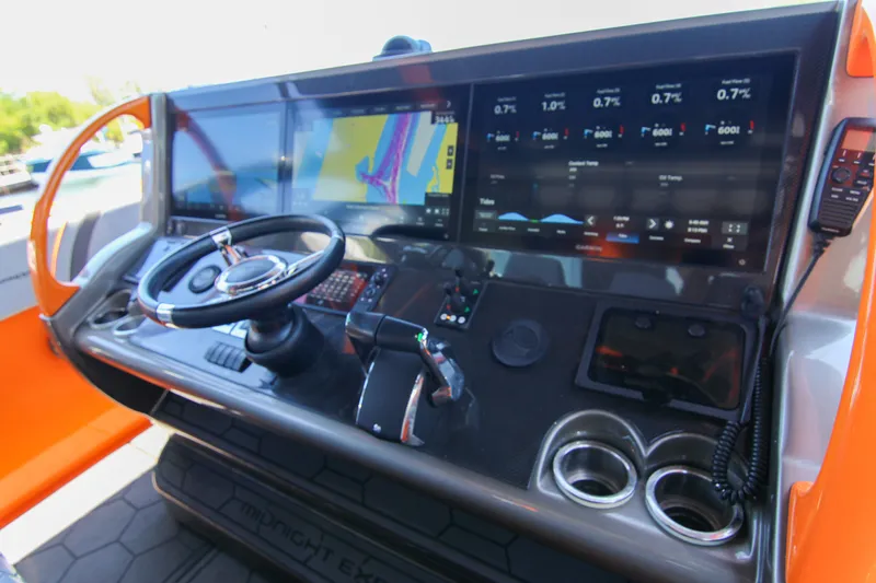 Yacht Photos Pics 2022 Midnight Express 43 Open boat dashboard with advanced navigation and control systems.