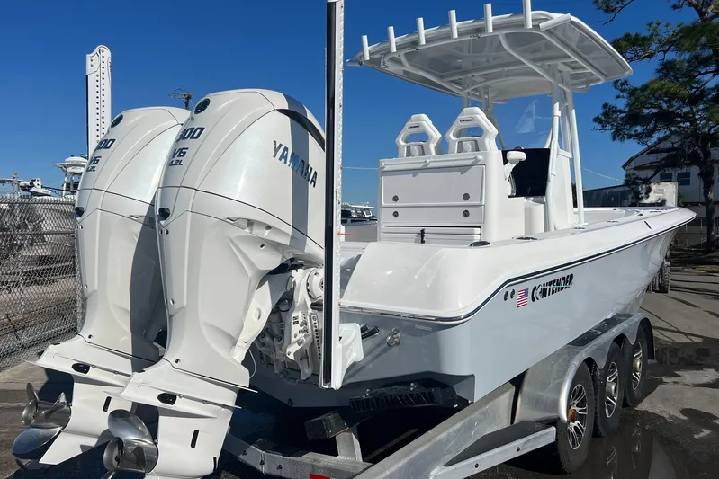  Yacht Photos Pics 2026 Contender 29 Bay boat with twin Yamaha V6 engines on a trailer.