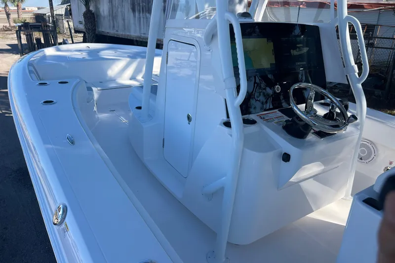  Yacht Photos Pics 2026 Contender 29 Bay boat interior with modern helm and sleek design.