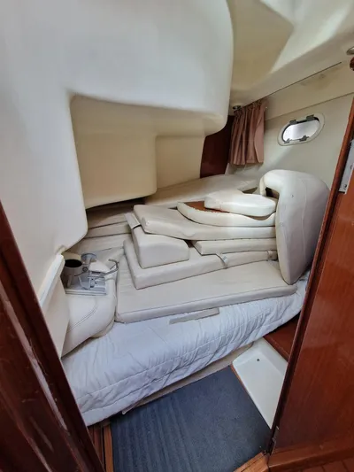  Yacht Photos Pics Interior cabin of 2005 Jeanneau PRESTIGE 32 FLY with stacked cushions.
