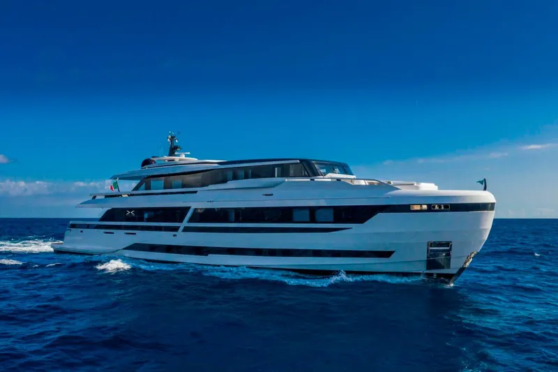 L.a.u.l. Yacht Photos Pics Luxurious 2019 ISA Extra 130 Alloy yacht cruising on open sea under clear blue sky.