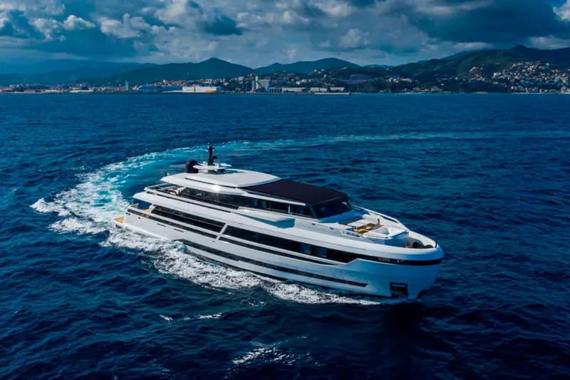 L.a.u.l. Yacht Photos Pics Luxurious 2019 ISA Extra 130 Alloy yacht cruising on open sea under cloudy skies.
