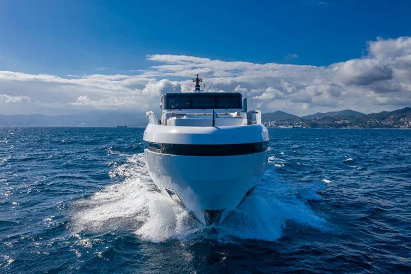 L.a.u.l. Yacht Photos Pics Front view of 2019 ISA Extra 130 Alloy yacht cruising on open sea.