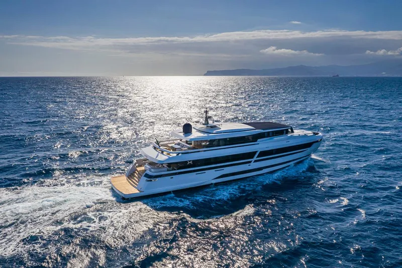 L.a.u.l. Yacht Photos Pics Luxurious 2019 ISA Extra 130 Alloy yacht cruising on open sea under clear sky.