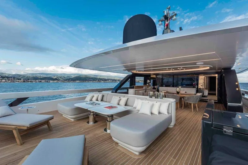 L.a.u.l. Yacht Photos Pics Luxurious 2019 ISA Extra 130 Alloy yacht deck with modern seating and ocean view.