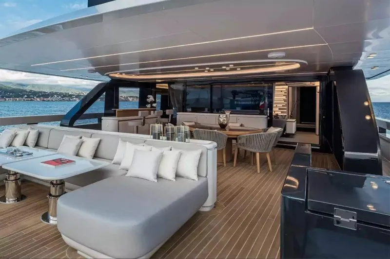 L.a.u.l. Yacht Photos Pics Luxurious 2019 ISA Extra 130 Alloy yacht deck with elegant seating and dining area.