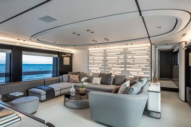 L.a.u.l. Yacht Photos Pics Luxurious interior of 2019 ISA Extra 130 Alloy yacht with modern seating and ocean view.