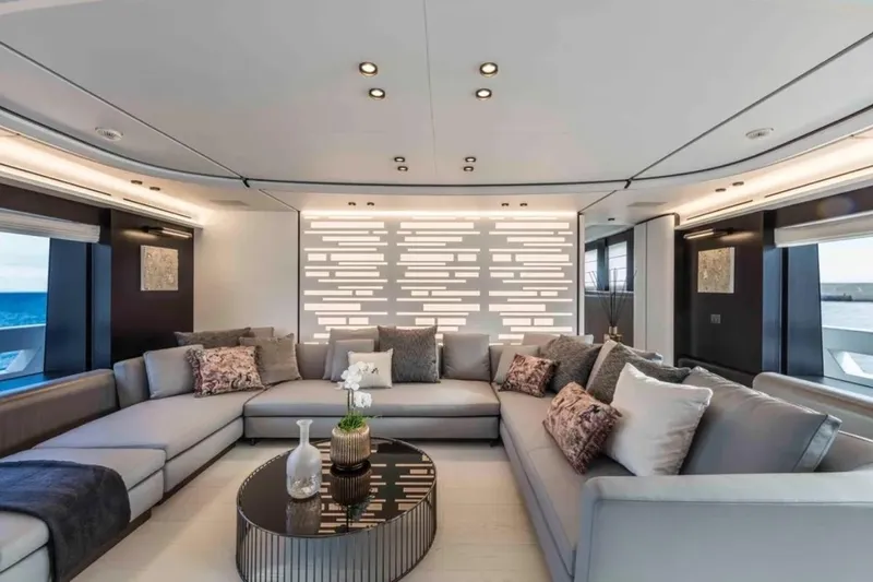 L.a.u.l. Yacht Photos Pics Luxurious yacht interior with modern decor, featuring plush seating and elegant lighting, ISA Extra 130 Alloy 2019.