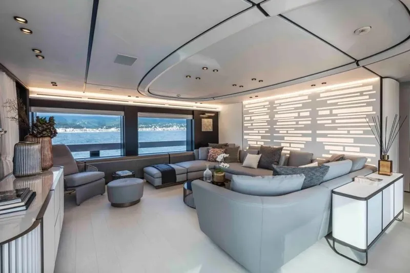 L.a.u.l. Yacht Photos Pics Luxurious interior of 2019 ISA Extra 130 Alloy yacht with modern seating and panoramic windows.