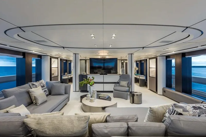 L.a.u.l. Yacht Photos Pics Luxurious interior of 2019 ISA Extra 130 Alloy yacht with modern furnishings and ocean views.
