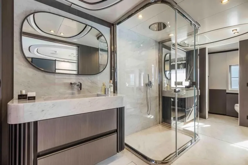 L.a.u.l. Yacht Photos Pics Luxurious yacht bathroom with glass shower, modern fixtures, and elegant design. ISA Extra 130 Alloy 2019.