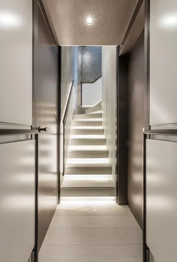 L.a.u.l. Yacht Photos Pics Modern staircase with sleek design and ambient lighting on ISA Extra 130 Alloy yacht, 2019.