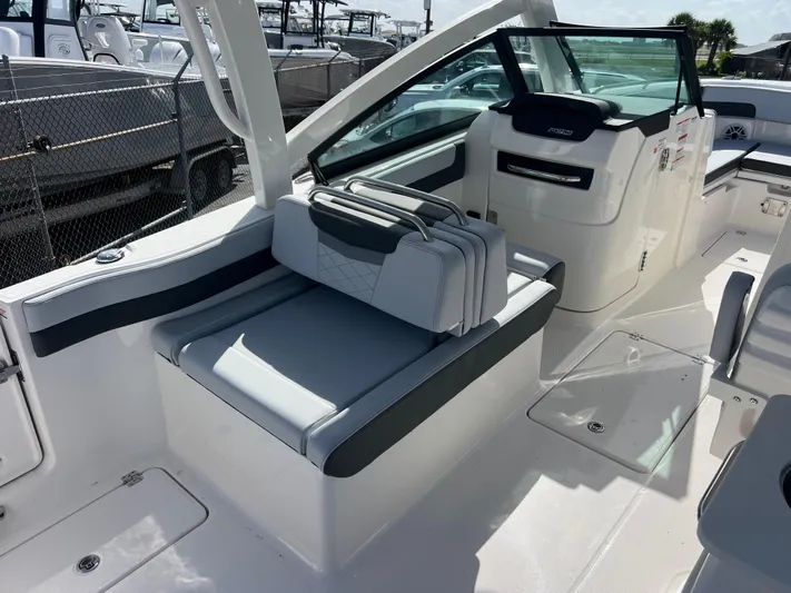  Yacht Photos Pics 2025 Robalo R257 Dual Console boat interior with sleek seating and modern design.