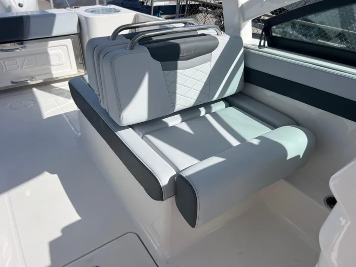  Yacht Photos Pics 2025 Robalo R257 Dual Console boat seat with elegant gray upholstery and modern design.