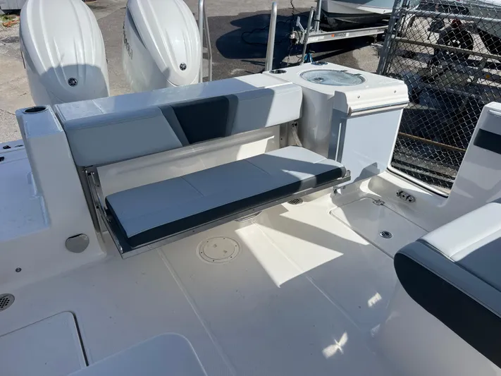  Yacht Photos Pics 2025 Robalo R257 Dual Console boat interior with seating and dual engines.