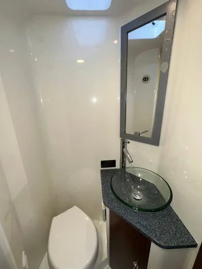 Wooocrew Yacht Photos Pics 2015 SeaVee 43 Fish-Around bathroom with modern sink and mirror.