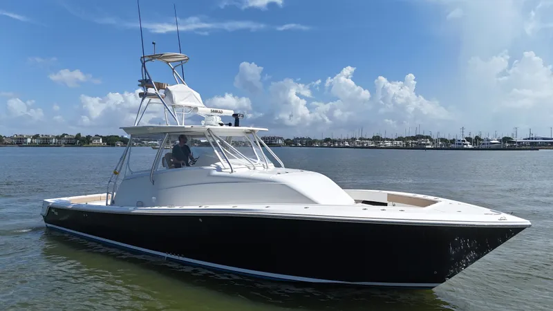 Wooocrew Yacht Photos Pics 2015 SeaVee 43 Fish-Around boat cruising on a sunny day.