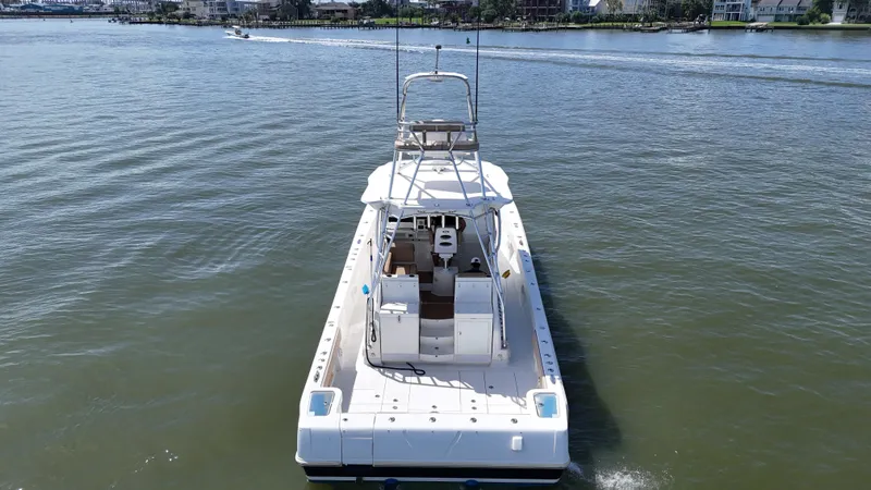 Wooocrew Yacht Photos Pics 2015 SeaVee 43 Fish-Around boat cruising on calm waters.