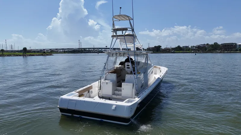 Wooocrew Yacht Photos Pics 2015 SeaVee 43 Fish-Around boat on calm water under a clear blue sky.