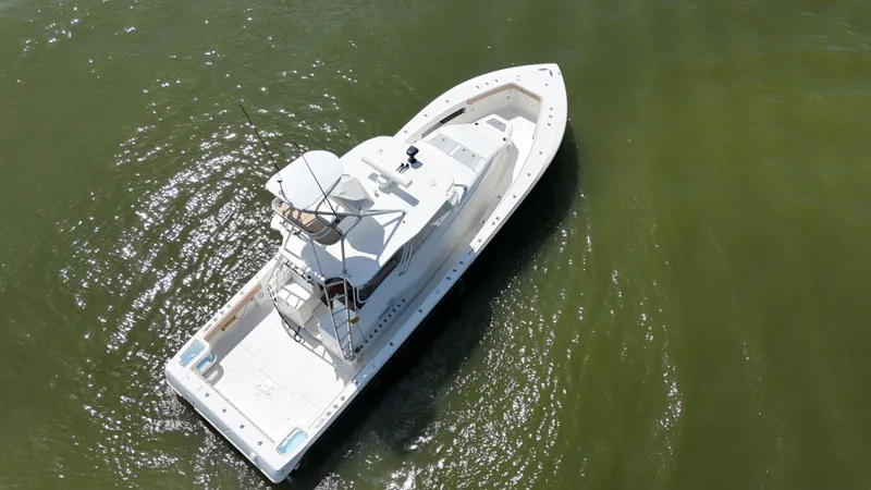 Wooocrew Yacht Photos Pics 2015 SeaVee 43 Fish-Around boat on calm green water, aerial view.