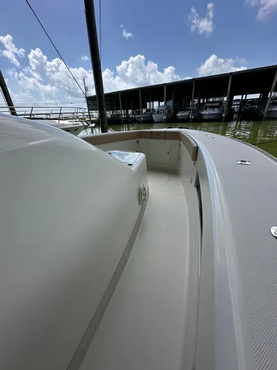 Wooocrew Yacht Photos Pics 2015 SeaVee 43 Fish-Around boat docked under a clear blue sky.