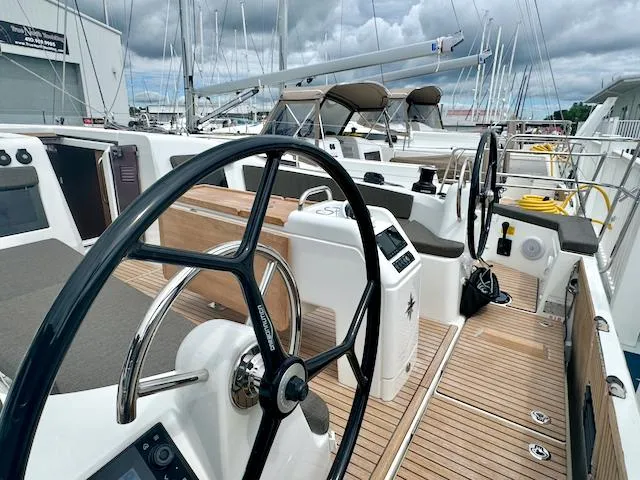 410 #345 In Stock Yacht Photos Pics 2024 Jeanneau Sun Odyssey 410 yacht with dual steering wheels and teak deck.