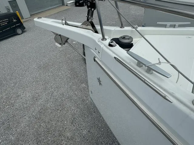410 #345 In Stock Yacht Photos Pics 2024 Jeanneau Sun Odyssey 410 yacht bow detail in a marina setting.