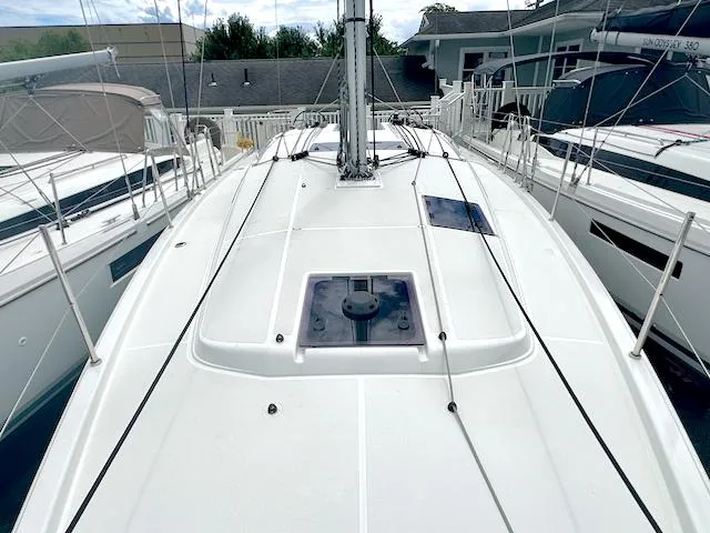 410 #345 In Stock Yacht Photos Pics 2024 Jeanneau Sun Odyssey 410 sailboat deck view at marina.