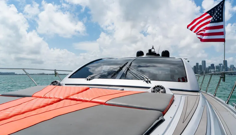 D Padron Yacht Photos Pics 2013 Azimut Atlantis 58 yacht with American flag, cruising on a sunny day.