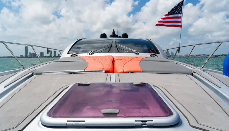 D Padron Yacht Photos Pics Azimut Atlantis 58 yacht, 2013 model, with American flag, cruising on a sunny day.