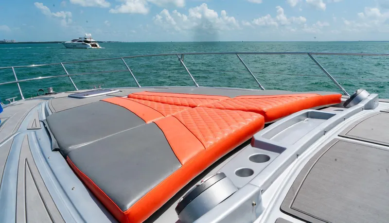 D Padron Yacht Photos Pics Luxurious 2013 Azimut Atlantis 58 yacht with vibrant sunbathing cushions on deck.