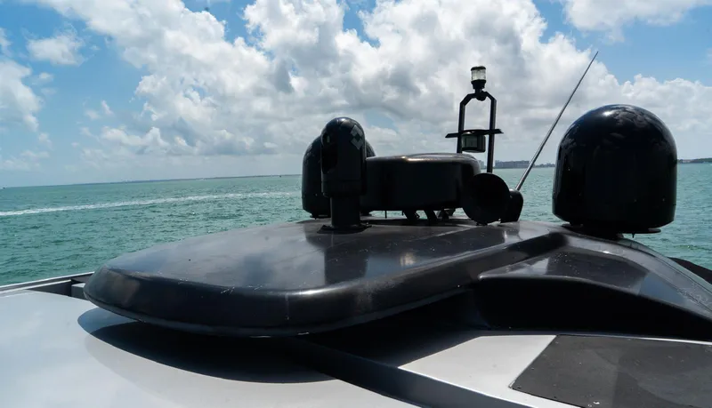 D Padron Yacht Photos Pics Azimut Atlantis 58 yacht roof view, 2013 model, against a scenic ocean backdrop.