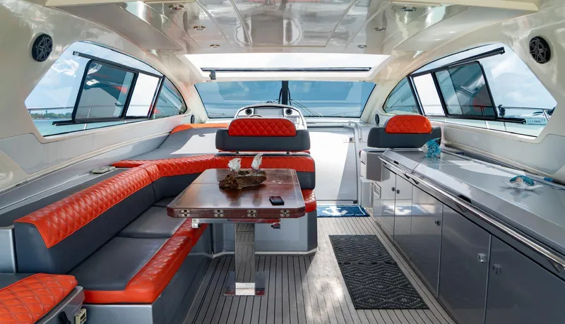 D Padron Yacht Photos Pics Luxurious interior of 2013 Azimut Atlantis 58 yacht with modern seating and dining area.