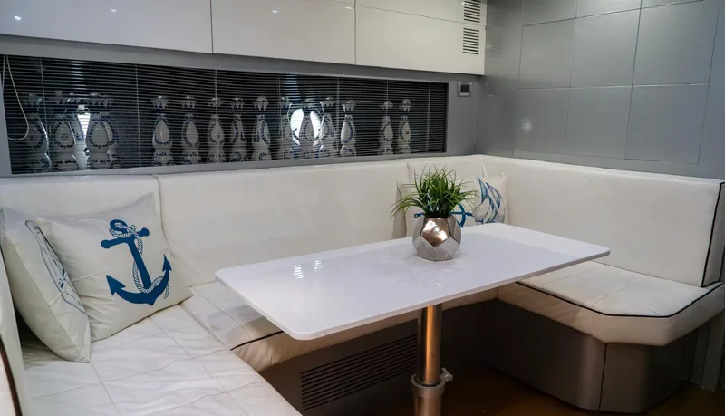 D Padron Yacht Photos Pics Luxurious interior of 2013 Azimut Atlantis 58 yacht with elegant seating and nautical decor.