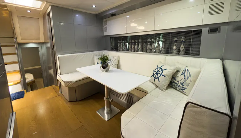 D Padron Yacht Photos Pics Luxurious interior of 2013 Azimut Atlantis 58 yacht with elegant seating and decor.