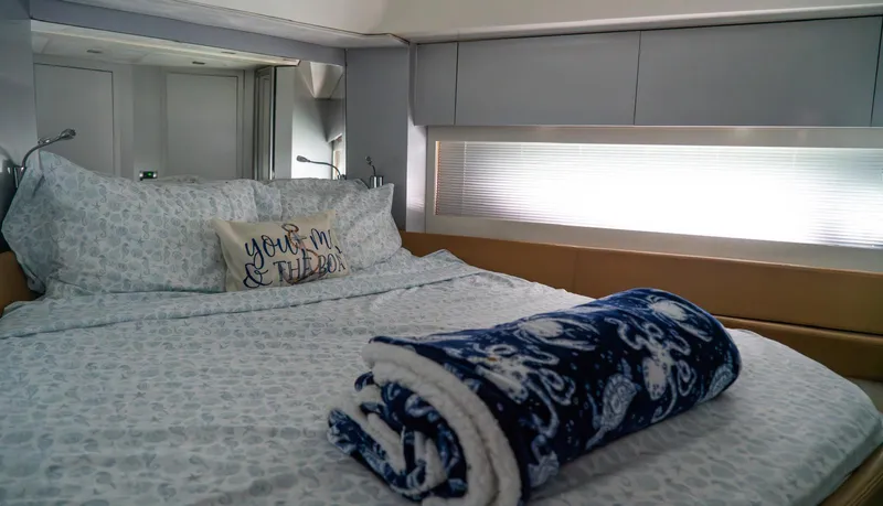 D Padron Yacht Photos Pics Luxurious bedroom interior of 2013 Azimut Atlantis 58 yacht with cozy bedding.